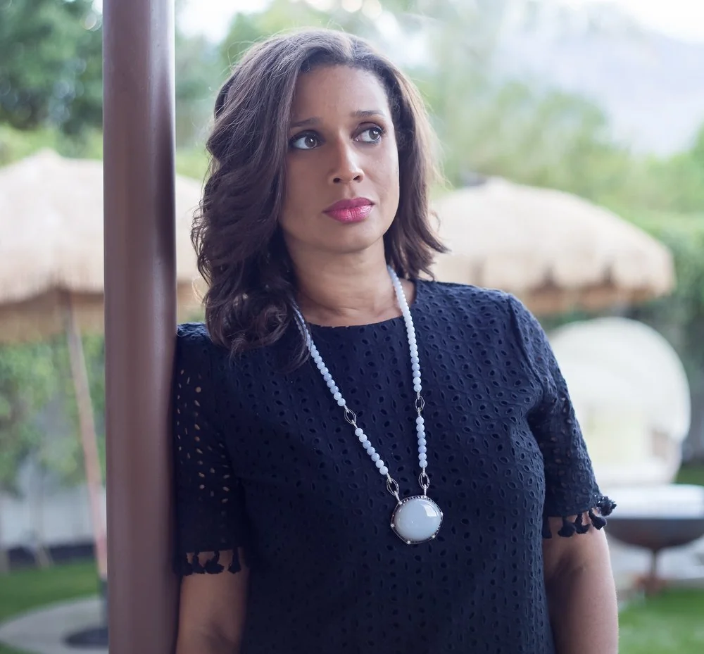 Portrait of Anita Dolce Vita wearing black and a long necklace