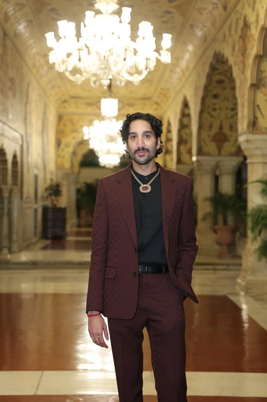 Rajiv Menon standing in the City Palace in Jaipur